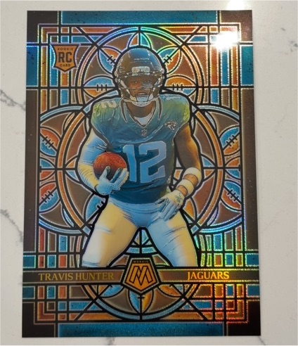 2025 Panini Mosaic #12 Travis Hunter — front