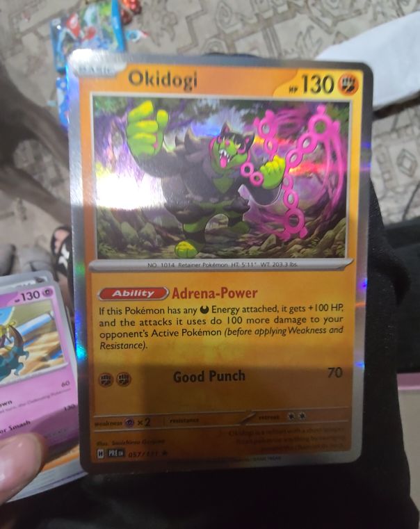 2025 Pokémon Prismatic Evolutions #057 Okidogi — front
