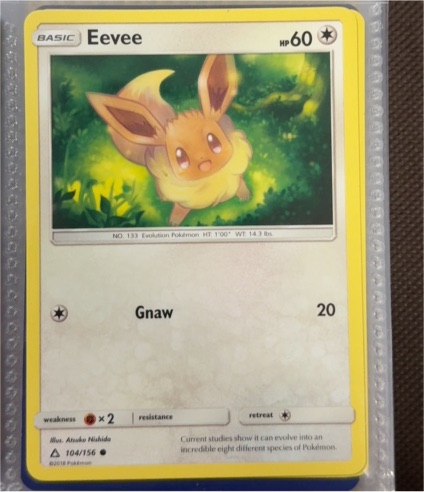 2018 Sun & Moon Ultra Prism #104 Eevee — front