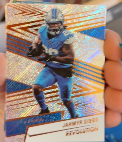 2025 Panini Revolution #103 Jahmyr Gibbs — front
