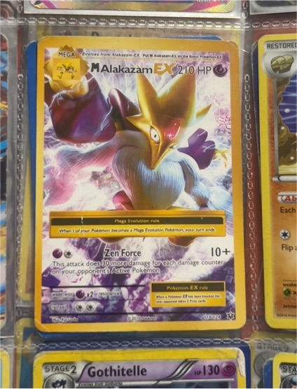 2013 Pokémon #103 M Alakazam EX — front