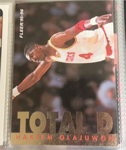 1995-96 Fleer #6 Hakeem Olajuwon Total D — front