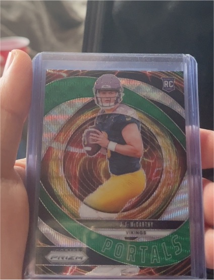 2024 Panini Prizm #7 J.J. McCarthy Portals Green Wave Rookie — front