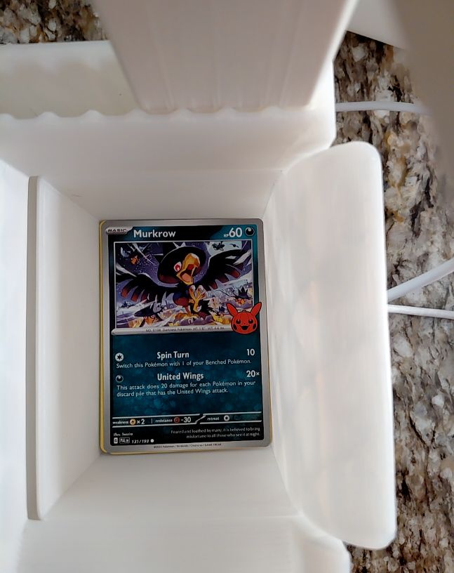2023 Pokémon TCG Paldea Evolved #131 Murkrow — front