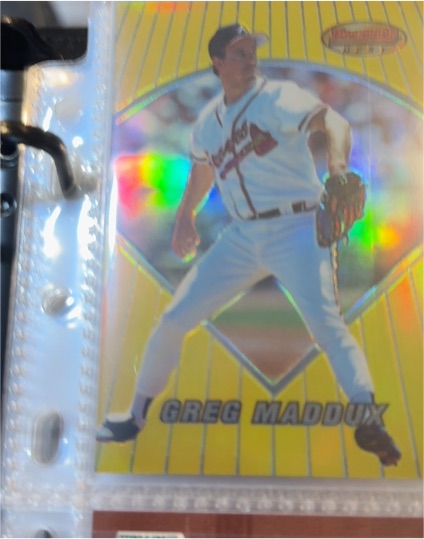 1998 Pinnacle Epix Play Orange #E21 Greg Maddux — front