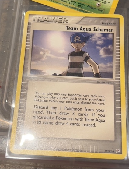 2004 EX Team Magma vs Team Aqua #69 Team Aqua Schemer — front
