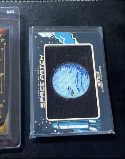2023 Upper Deck Goodwin Champions Glow in the Dark Space Patch Neptune #GSP-72 — front