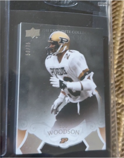 2011 Upper Deck Exquisite Collection #50 Charles Woodson — front