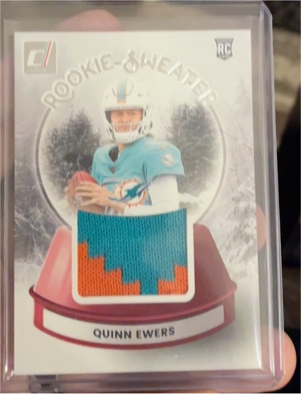 2025 Donruss Football #SWE-QES Quinn Ewers Rookie Holiday Sweater — front