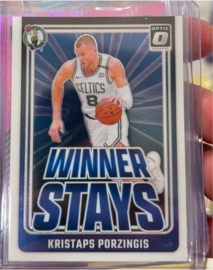 2024-25 Panini Donruss Optic #9 Kristaps Porzingis Winner Stays — front