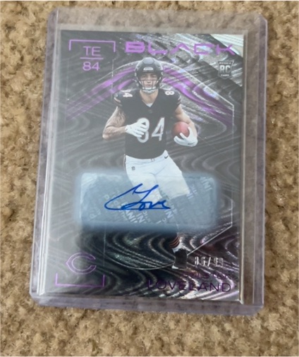2025 Panini Black #84 T.J. Hockenson — front