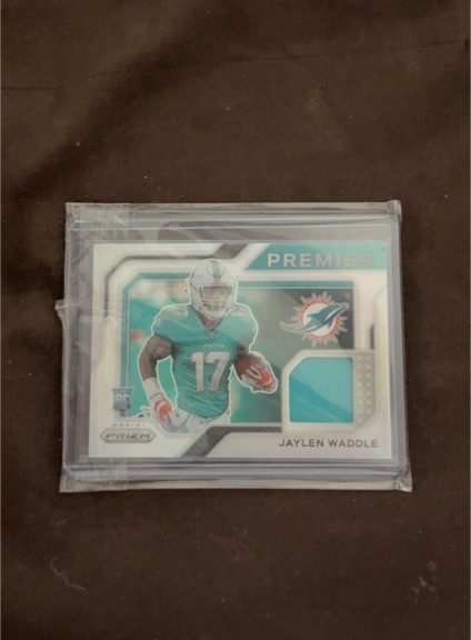 2021 Panini Prizm Premier Jerseys #PJ-8 Jaylen Waddle — front