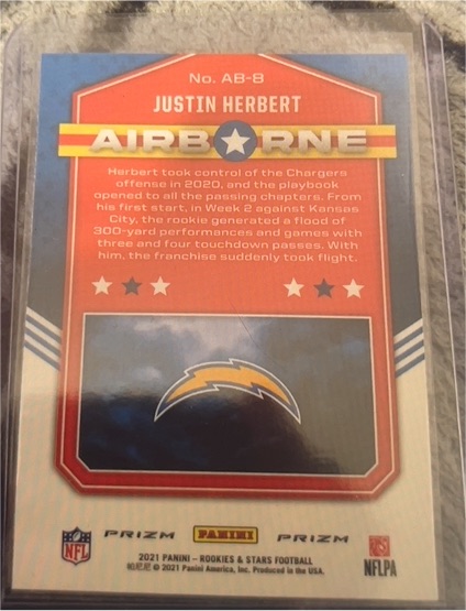 2021 Panini Rookies & Stars Airborne #AB-8 Justin Herbert — front