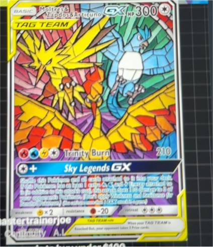 2019 Pokémon SM Black Star Promo #SM210 Moltres & Zapdos & Articuno GX — front