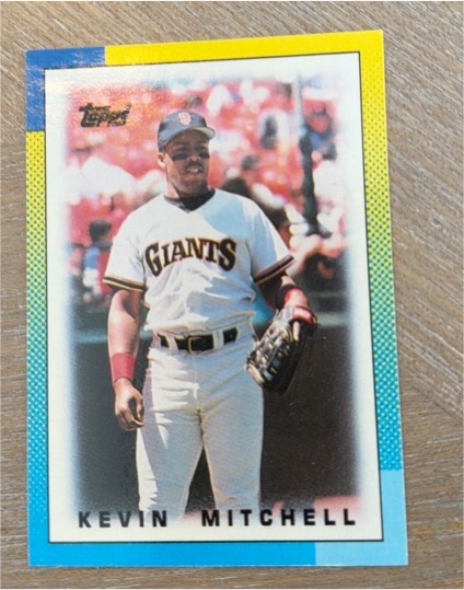 1990 Topps #703 Kevin Mitchell — front