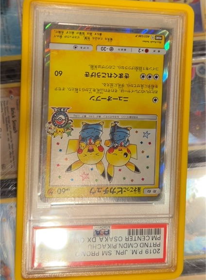 2019 Pokemon Center Osaka DX Promo #407/SM-P Pretend Comedian Pikachu — front