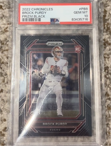 2022 Panini Chronicles Prizm Black #PB8 Brock Purdy — front