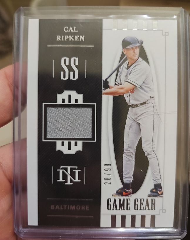 2021 Panini National Treasures Game Gear #GG-CR Cal Ripken — front