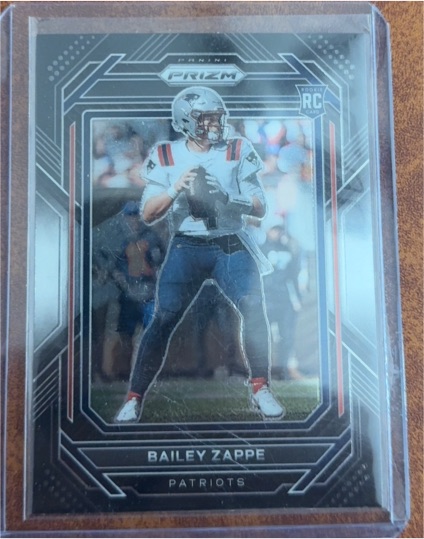2022 Panini Chronicles Prizm Black #PB-24 Bailey Zappe — front