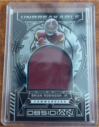 2022 Panini Obsidian #UM-BRJ Brian Robinson Jr. — front