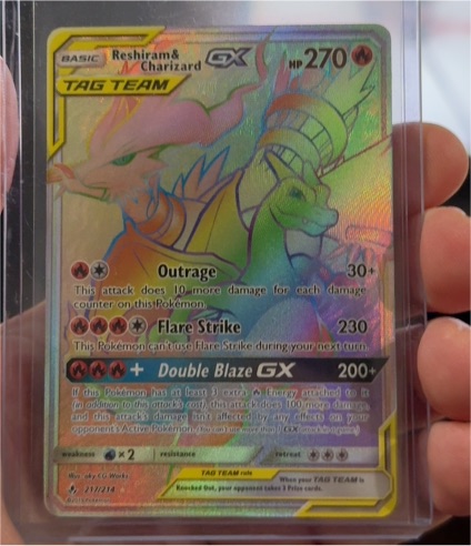 2019 Pokémon SM10 #108 Reshiram & Charizard GX — front