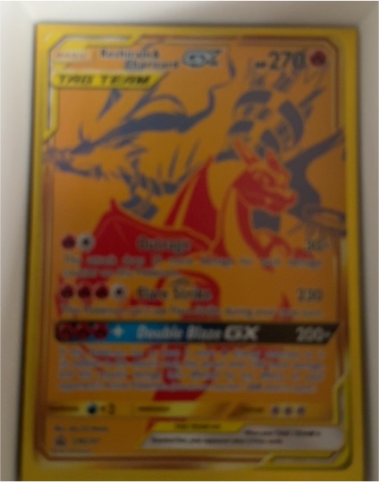 2021 Pokémon SM Black Star Promo #SM247 Reshiram & Charizard GX — front
