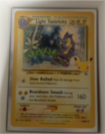 2021 Pokémon SWSH Black Star Promo #SWSH137 Light Toxtricity — front