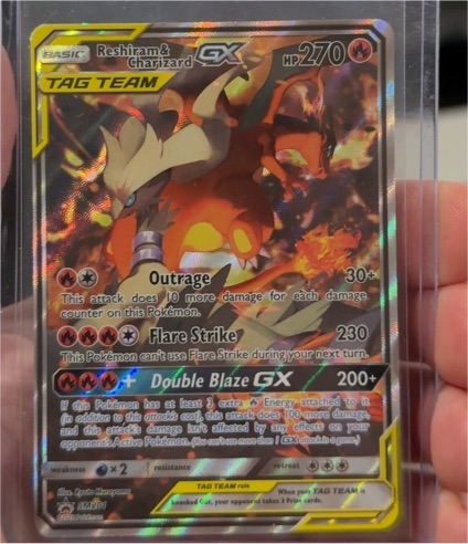 2019 Pokémon SM201 Reshiram & Charizard GX Black Star Promo — front