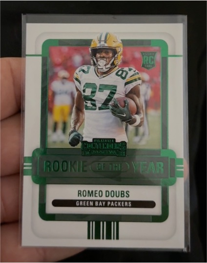 2022 Panini Contenders Rookie of the Year #ROY-RDO Romeo Doubs — front