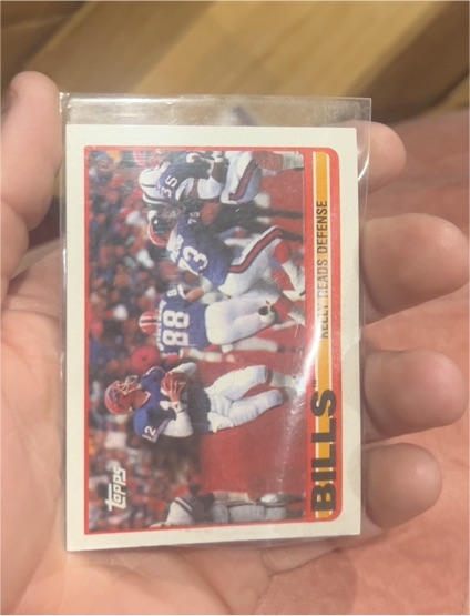 1989 Topps #40 Buffalo Bills Team Leaders (Kelly Reads Defense) — front