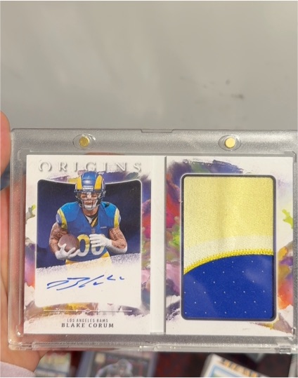 2024 Panini Origins Blake Corum Rookie Patch Autograph Booklet — front
