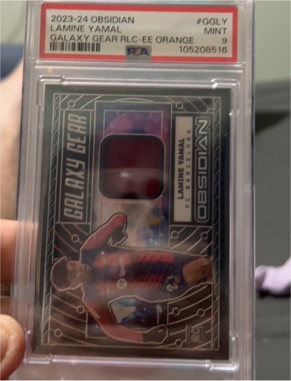 2023-24 Panini Obsidian #GGLY Lamine Yamal Galaxy Gear Relic Orange — front