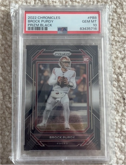 2022 Panini Chronicles Prizm Black #PB8 Brock Purdy — front