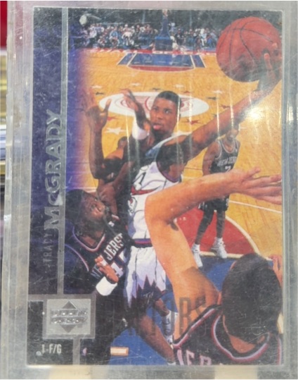 1997-98 Upper Deck #300 Tracy McGrady Rookie Card — front
