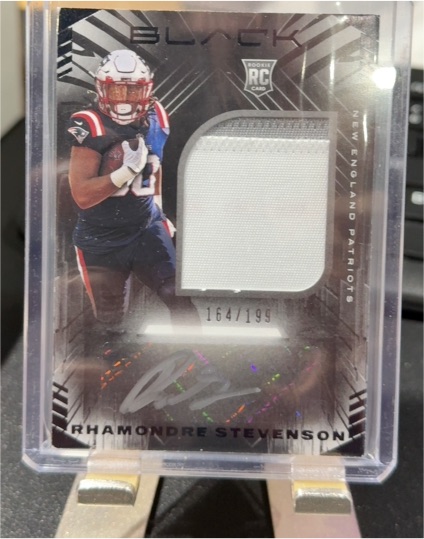 2021 Panini Black Rhamondre Stevenson Rookie Patch Auto /199 — front