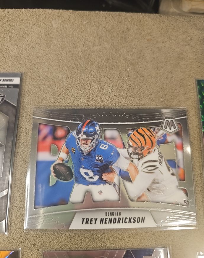 2025 Panini Mosaic Bang! #1 Trey Hendrickson — front