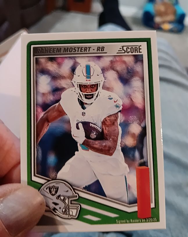 2025 Panini Score #160 Raheem Mostert — front