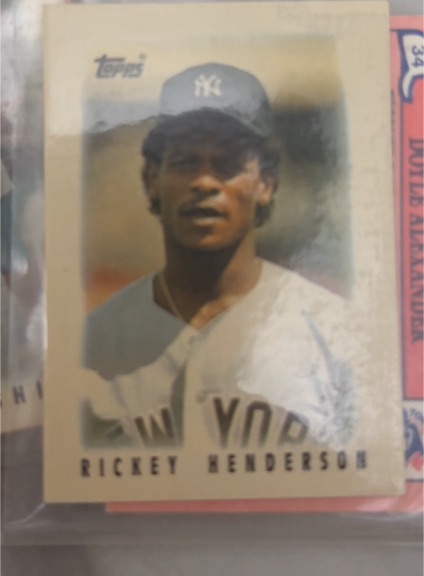 1986 Topps Major League Leaders Mini #27 Rickey Henderson — front