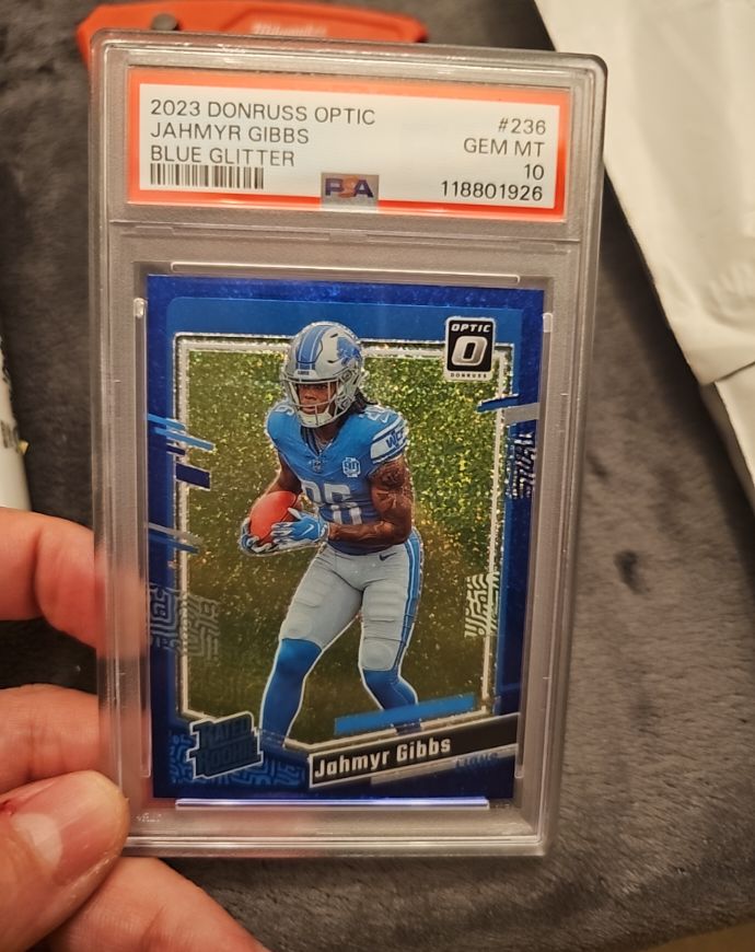 2023 Donruss Optic #236 Jahmyr Gibbs Blue Glitter — front