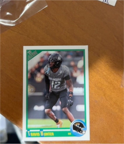2025 Panini Score #5 Travis Hunter Anniversary Rookie — front
