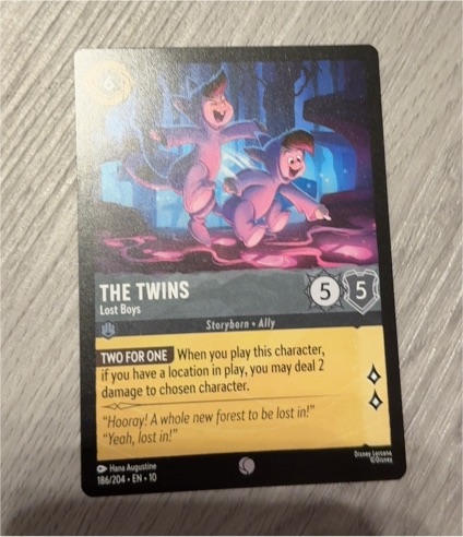Disney Lorcana Whispers in the Well #186 The Twins Lost Boys — front