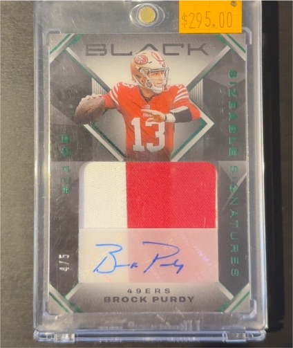 2023 Panini Black #15 Brock Purdy — front