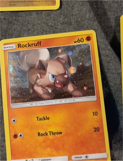 Pokémon TCG SM Promos #SM06 Rockruff — front