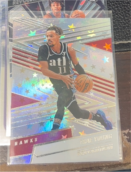 2024-25 Panini Revolution #27 Trae Young — front