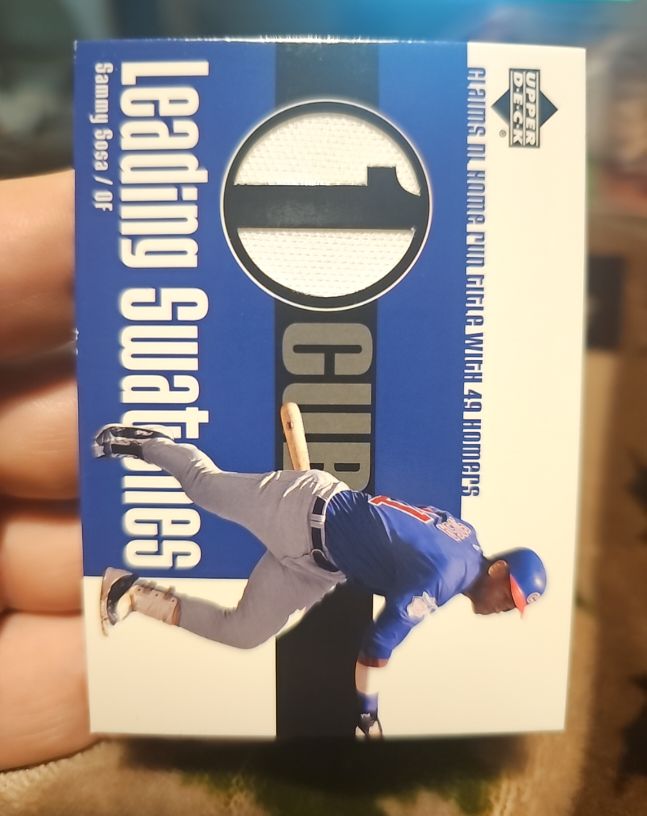 2003 Upper Deck Leading Swatches #LS-SS Sammy Sosa — front