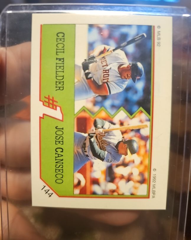 1992 Panini Stickers #144 Cecil Fielder Jose Canseco Detroit Tigers Oakland A's — front