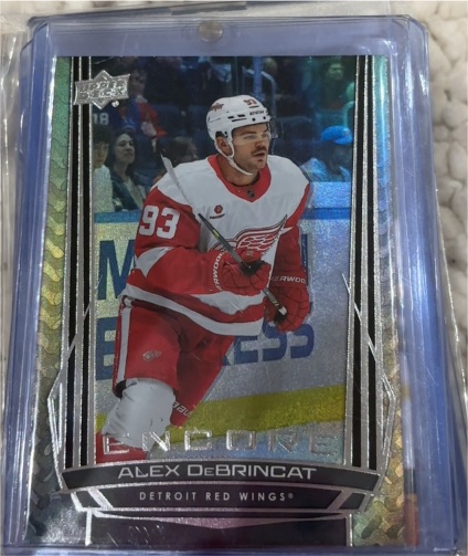 2025-26 Upper Deck Series 1 Encore #E-26 Alex DeBrincat — front