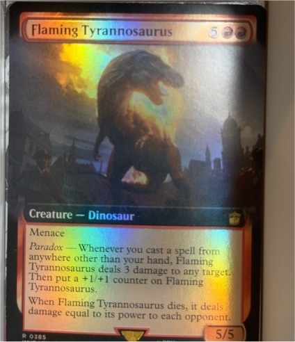 2023 Magic: The Gathering #0385 Flaming Tyrannosaurus — front