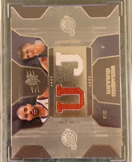2007 Upper Deck SPx Winning Materials Combos #WMC-KB Andrei Kirilenko & Carlos Boozer — front