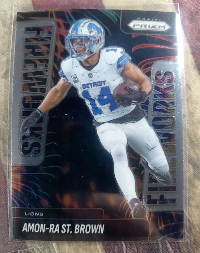 2025 Panini Prizm #16 Amon-Ra St. Brown Fireworks — front